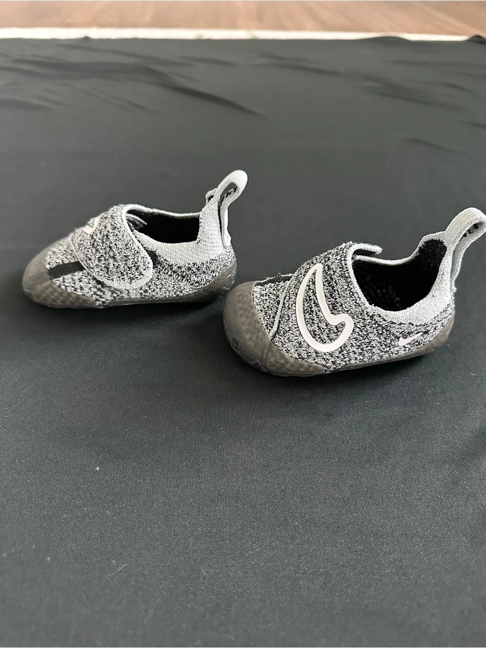 Nike Kids Slip-On Sneakers in Black and Gray